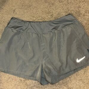 Nike dri-fit size L women’s athletic shorts in light grey